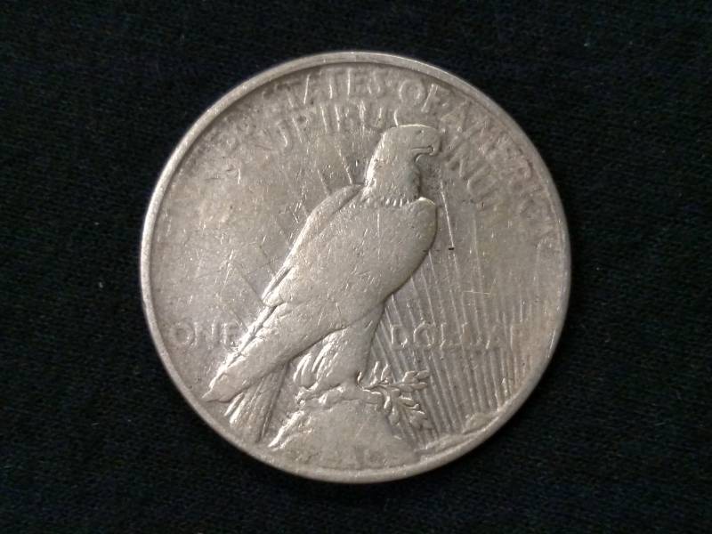 lot 30 image: 1927 D Peace Silver Dollar...