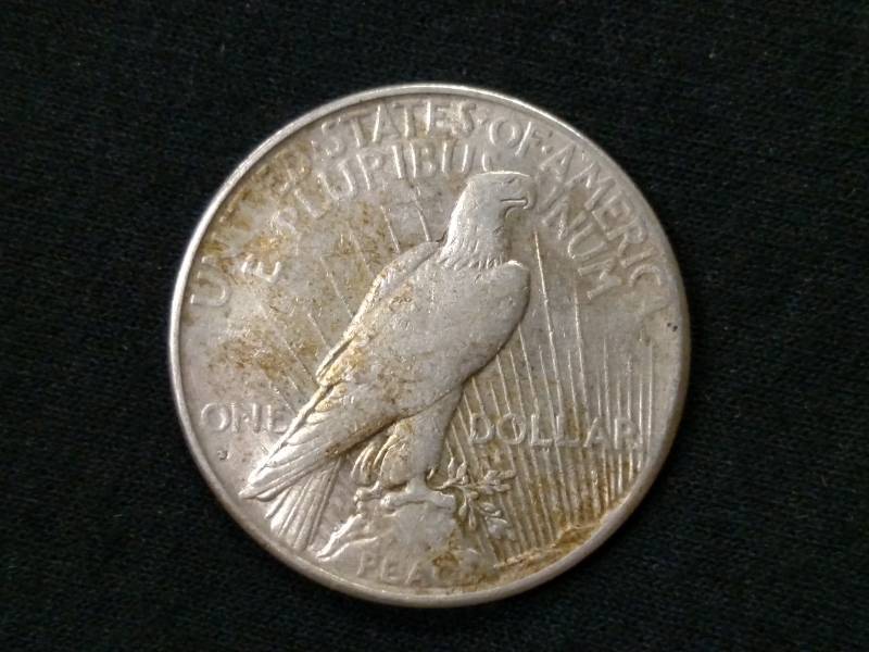 lot 32 image: 1928 S Peace Silver Dollar...