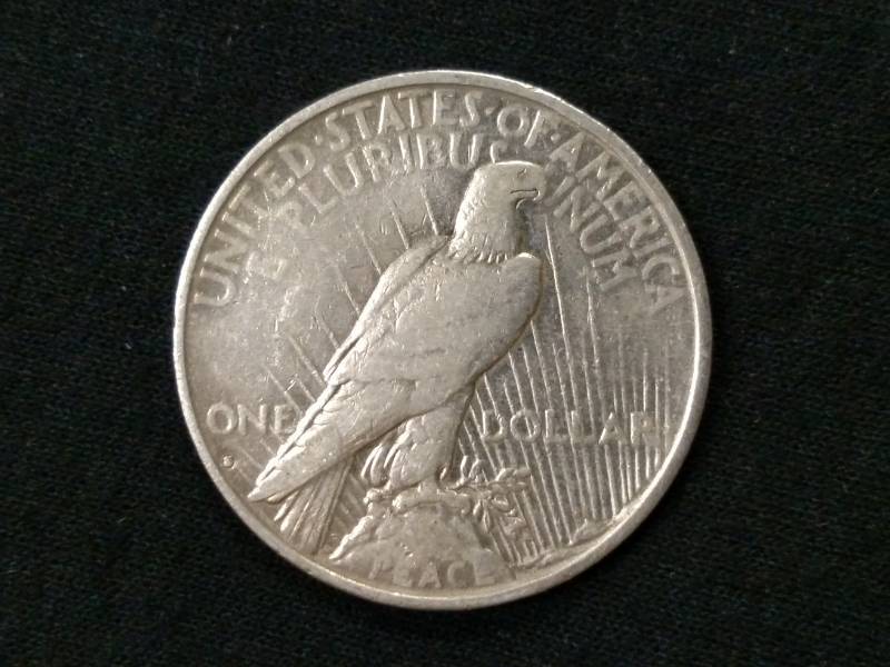 lot 33 image: 1935 S Peace Silver Dollar...