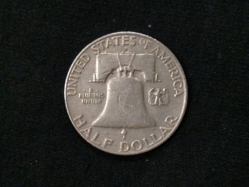 lot 44 image: 1957 D Franklin Silver Half Dollar...
