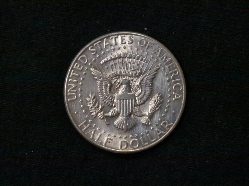 lot 48 image: 1964 Kennedy Silver Half Dollar...