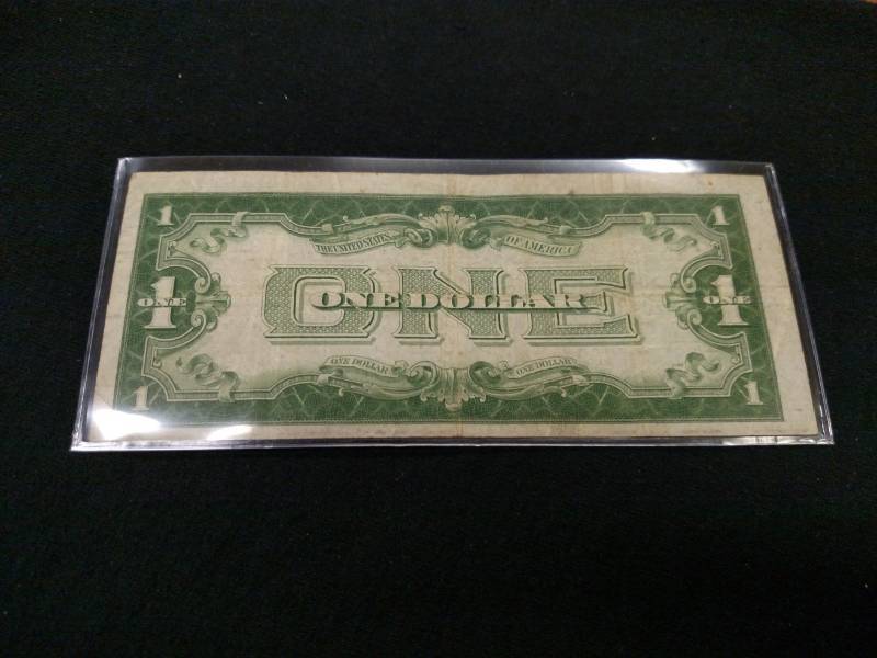 lot 60 image: 1934 Funny Back One Dollar Silver C...