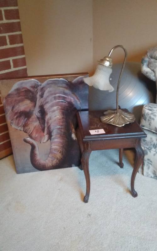 lot 4 image: Small Carved Table 12x12x16, Lily Pad Lamp, Elephant Picture, Exercise Ball