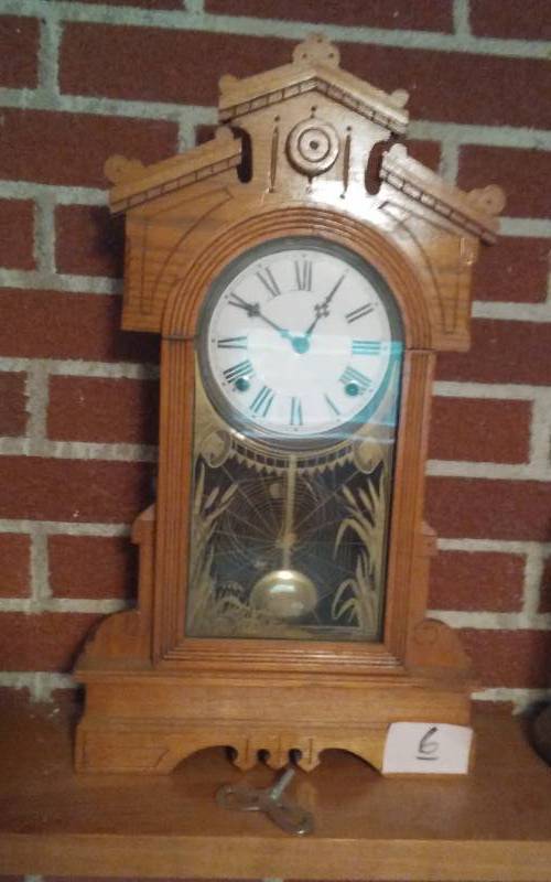 lot 6 image: Vintage Wood  Mantle Clock (Mfg By Wm L. Gilbert Clock Co., Winsted, Conn), With Key