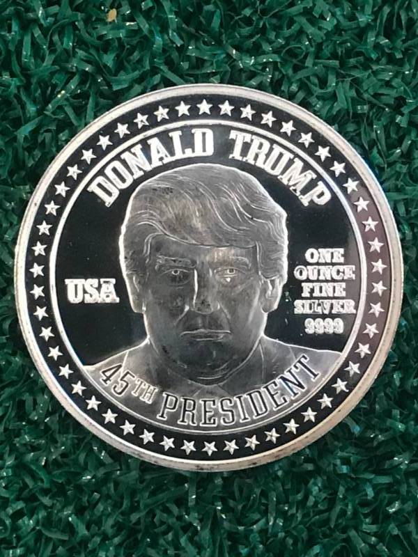lot 35 image: Donald Trump 1oz (one ounce) .999 Silver MAGA Coin