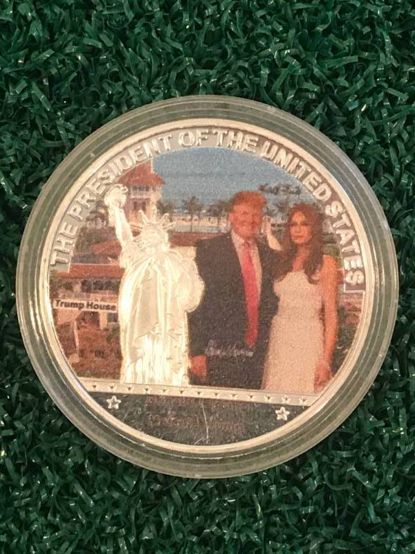 lot 46 image: Donald & Melania Trump Coin