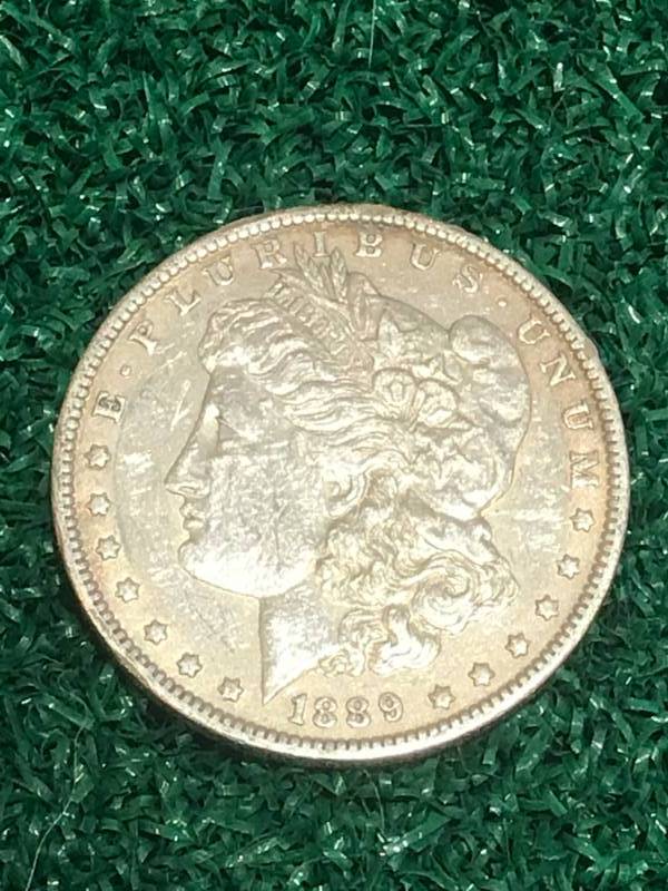 lot 53 image: 1889 Morgan Silver Dollar