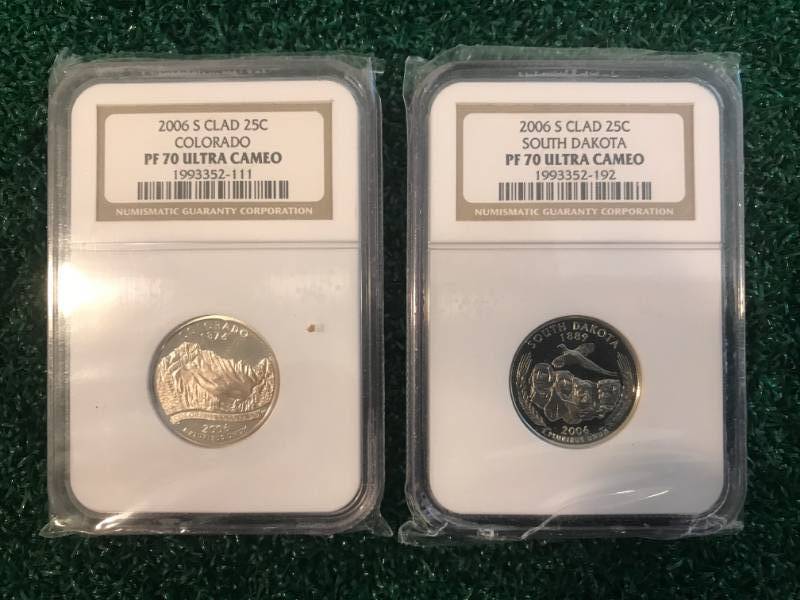 lot 54 image: 2006 South Dakota & Colorado PF70 Coins