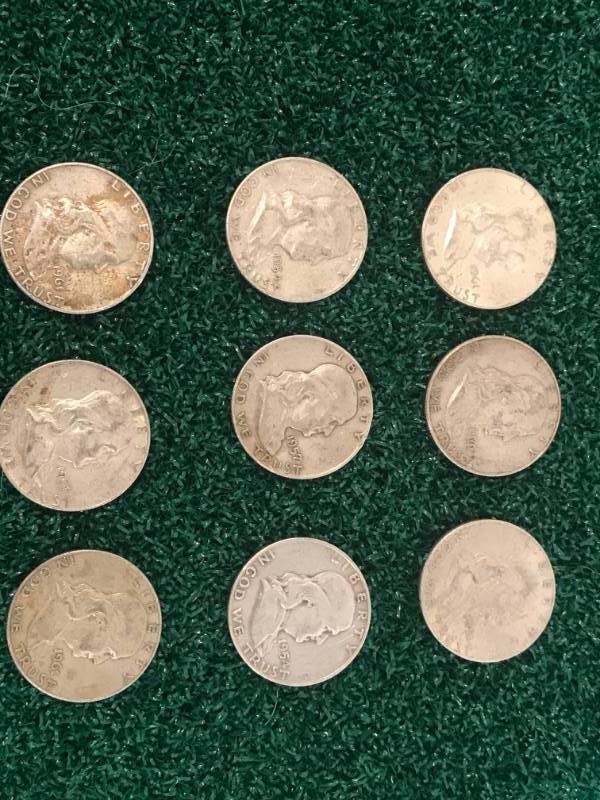 lot 71 image: Lot of 9 Franklin Half Dollars