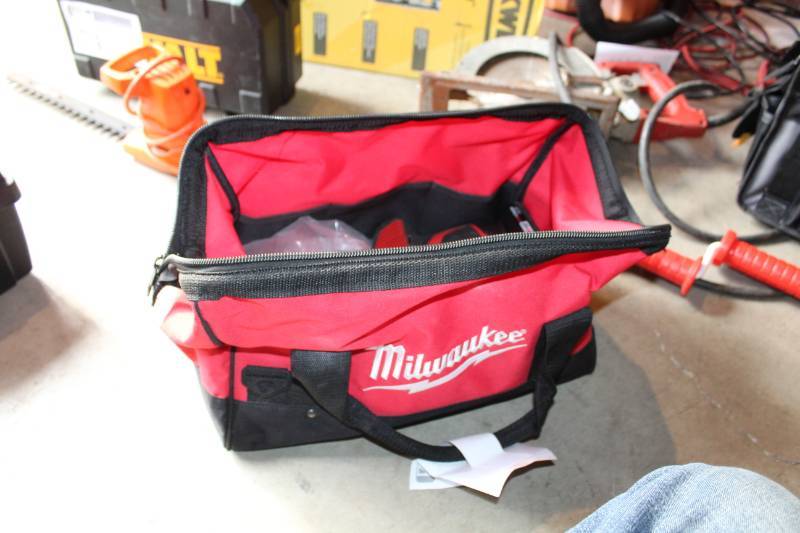 lot 90 image: Milwaukee Tools 12VDC Hackzall Reciprocating Saw, Cordless Flashlight, Tool Bag
