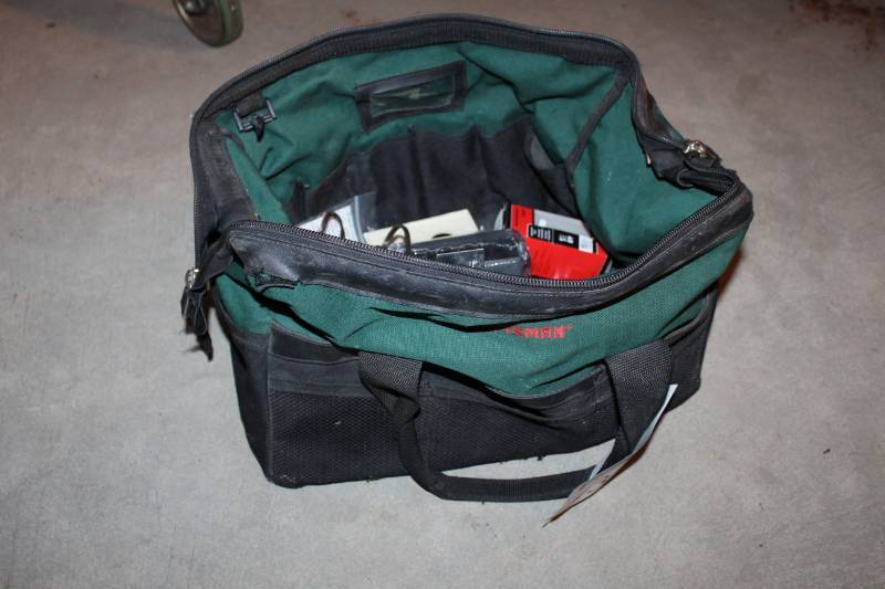 lot 131 image: Light Switches, Light Switch Covers, Putty Knife, Adjustable Wrench, Sockets, Tool Bag