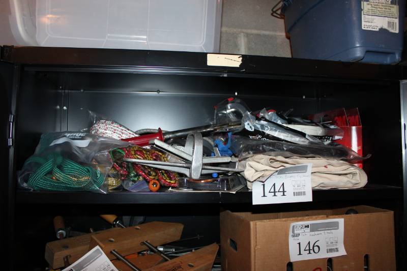 lot 144 image: Tarps, Bungee Cords, Tie-Downs, Floor Roller, Weather Seal, Window Insulator Kit