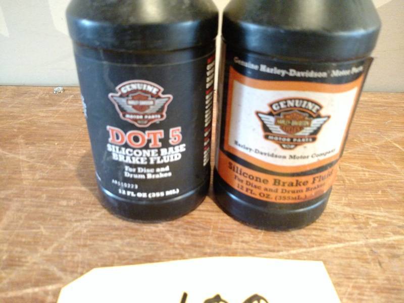lot 100 image: (2) 12 ounce  Harley Davidson Brake...