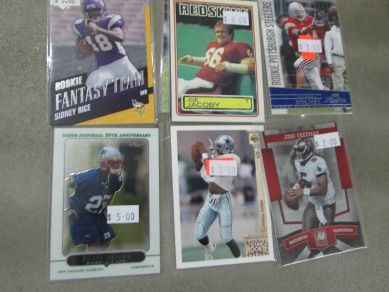 lot 8 image: 20 Football Rookie Cards...