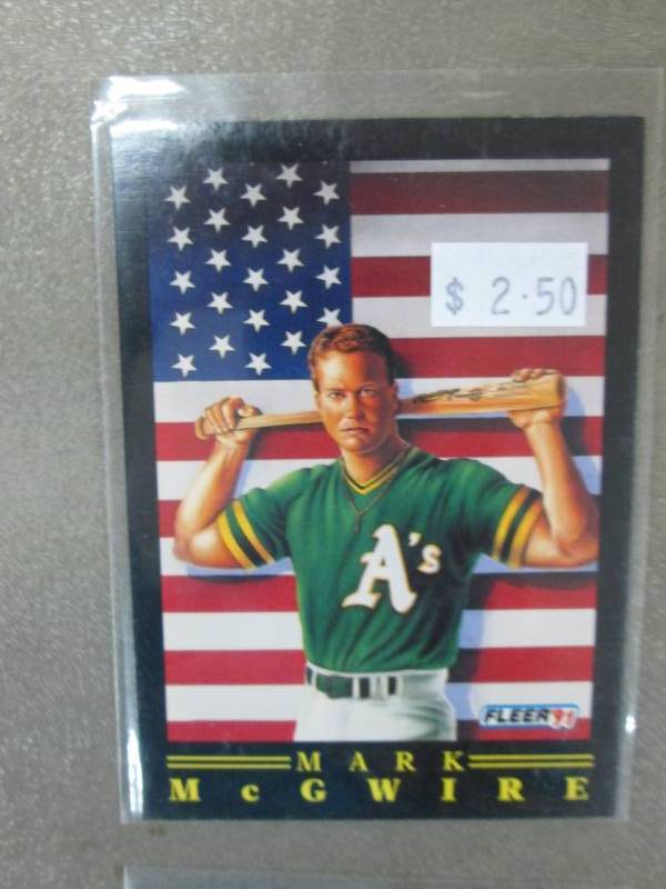 lot 98 image: 25 Mark McGwire Cards...