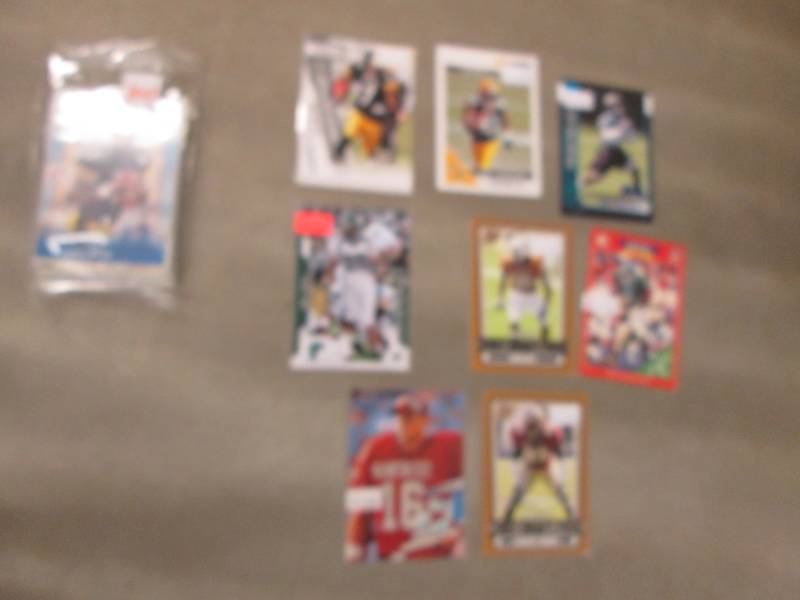lot 100 image: 20 Football Rookie Cards...