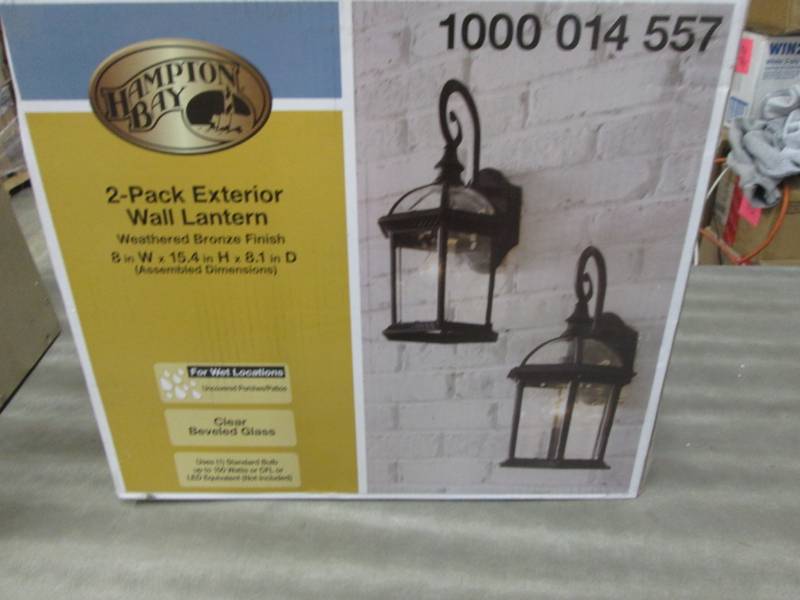 lot 215 image: Hampton Bay Twin Pack 1-Light Weath...