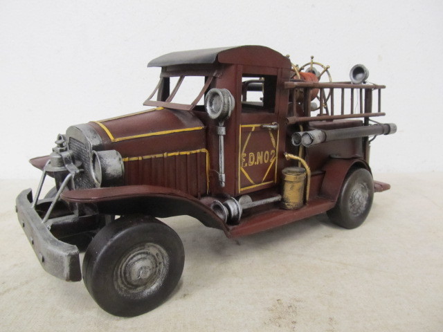 lot 28 image: Highly Detailed Hand Painted Vintage Style Metal Fire Truck