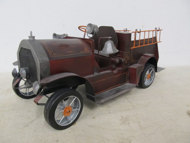 lot 29 image: Highly Detailed Hand Painted Vintage Style Metal Fire Truck