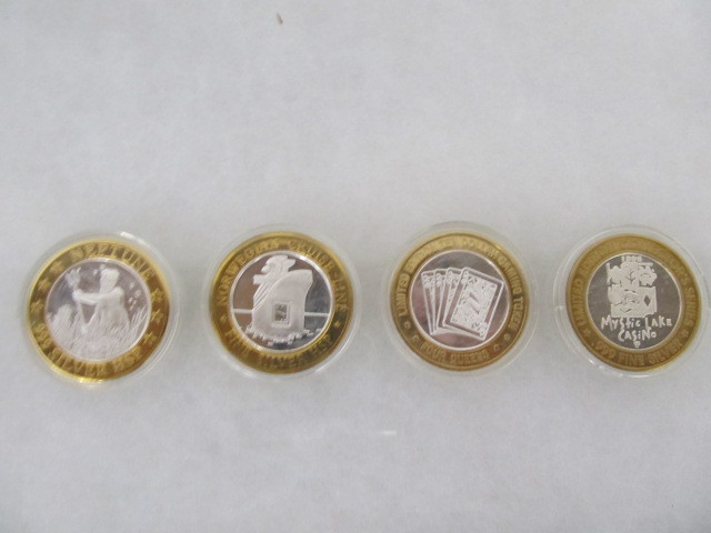 lot 67 image: Group of 4 Limited Edition .999 silver 1 oz Coins