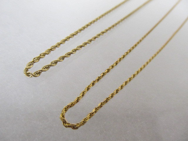 lot 69 image: Pair of Solid 14K Gold Italian Necklaces