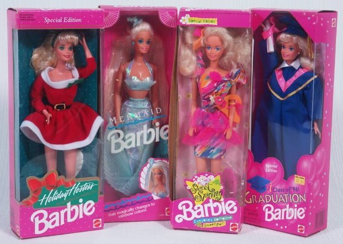 lot 54 image: Four Barbies