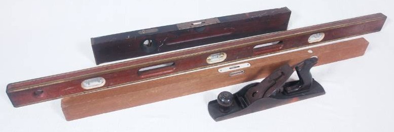 lot 43 image: Three Vintage Levels and One Hand Plane