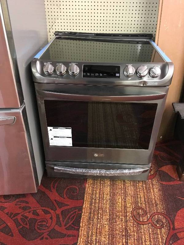 lot 272 image: LG LSE4613BD Smooth Top Stove, Retail $1,899.99