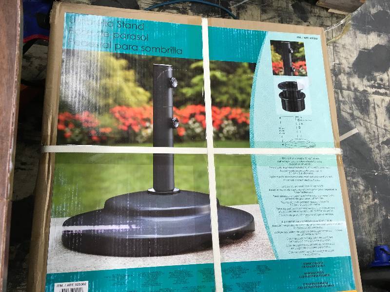 lot 285 image: Sungrade Umbrella Base 66Lbs, Retail $59.99