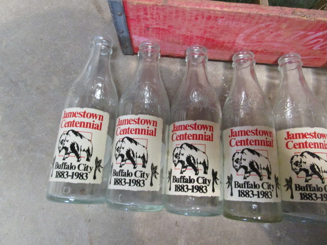 lot 67 image: Vintage Coke Bottles