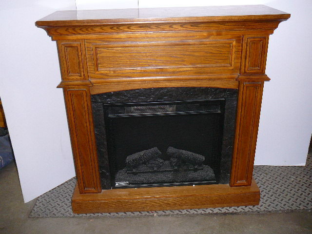 lot 10 image: Electric Fire Place with Oak Mantel