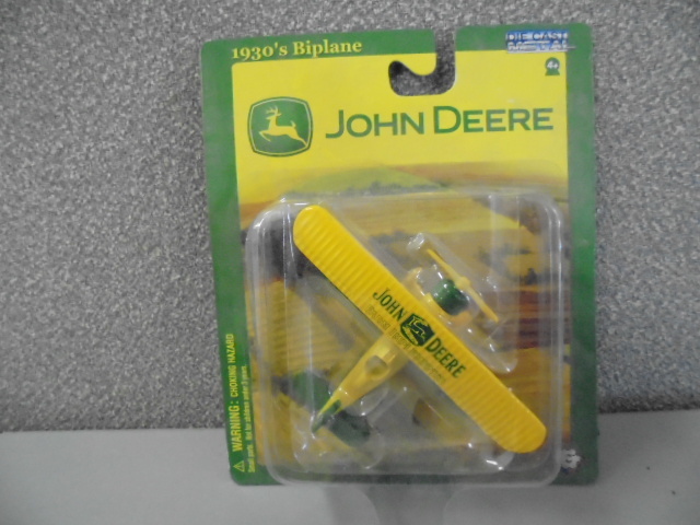 lot 27 image: John Deere Die Cast Model Plane