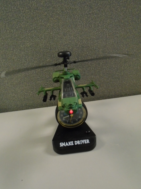 lot 93 image: Vintage Snake Driver Helicopter Quartz Alarm Clock