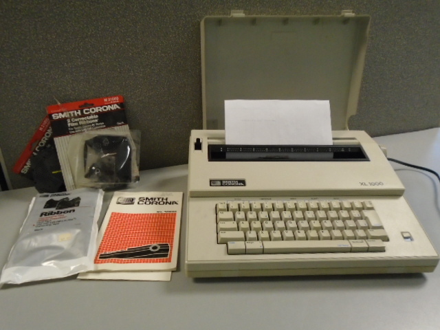 lot 185 image: Smith Corona Electric Typewriter and Ribbon
