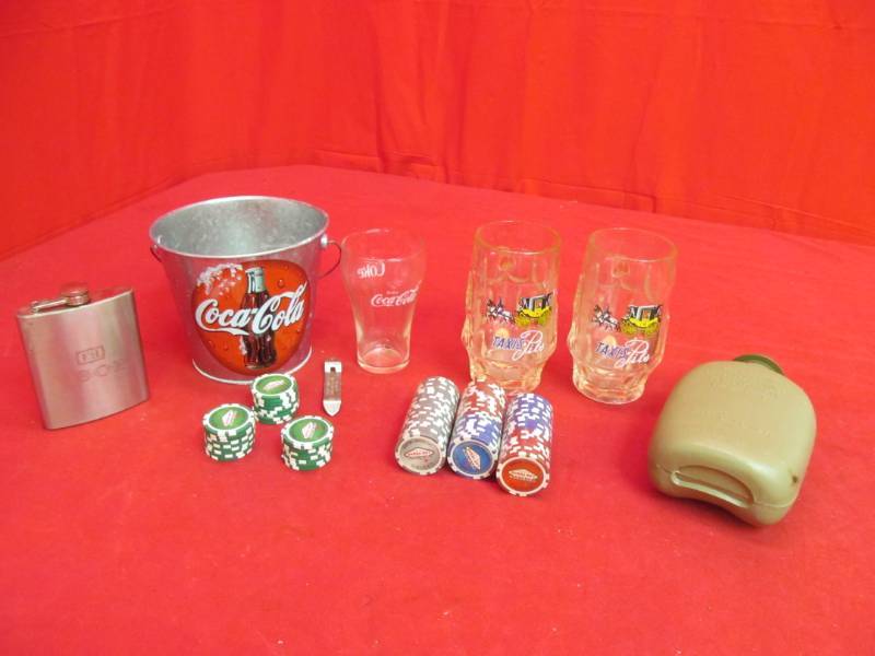 lot 27 image: Taxis Pils mugs, Coca Cola bucket, flask, canteen, LV casino poker chips, Coca Cola cup