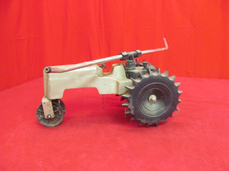 lot 31 image: Cast iron lawn sprinkler