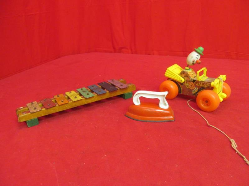 lot 32 image: Vintage toys (Fisher Price jalopy, iron, xylophone)