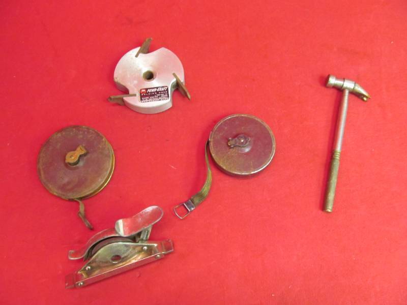 lot 55 image: Vintage cutter, molding head, vintage tape measure, vintage hammer