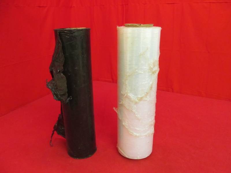 lot 59 image: black 2 mm plastic, 1 clear roll shrink wrap (length unknown)