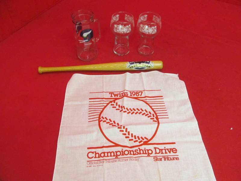 lot 95 image: Twins hanky, 2 Pepsi glasses, Vikings mug, bat