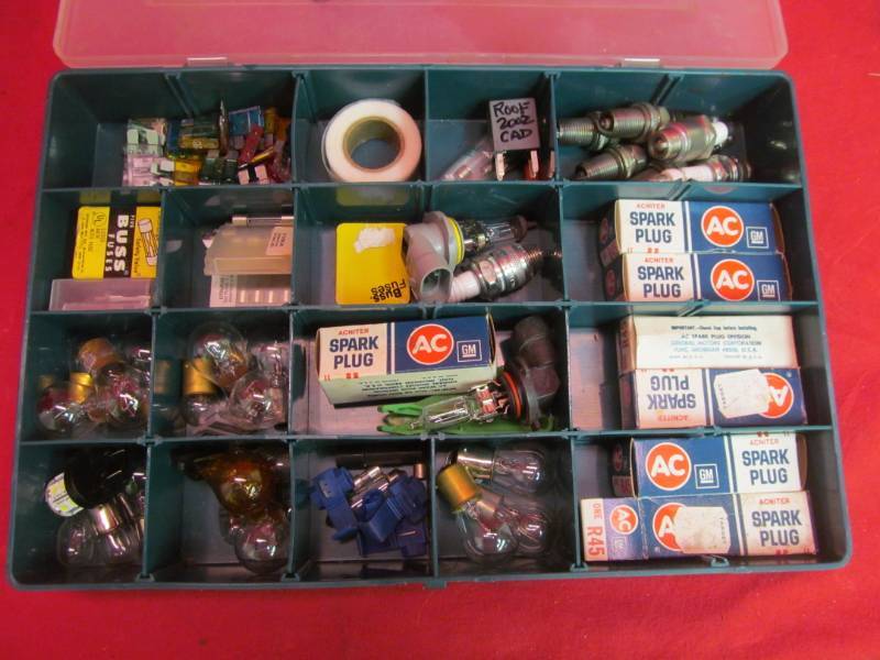 lot 117 image: Variety of spark plugs, light bulbs, fuses