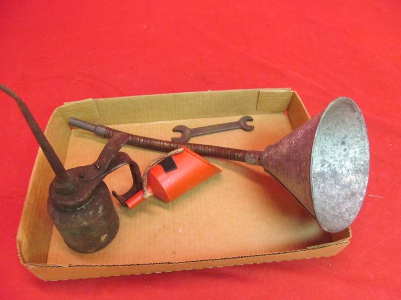 lot 125 image: Vintage oil can, funnels