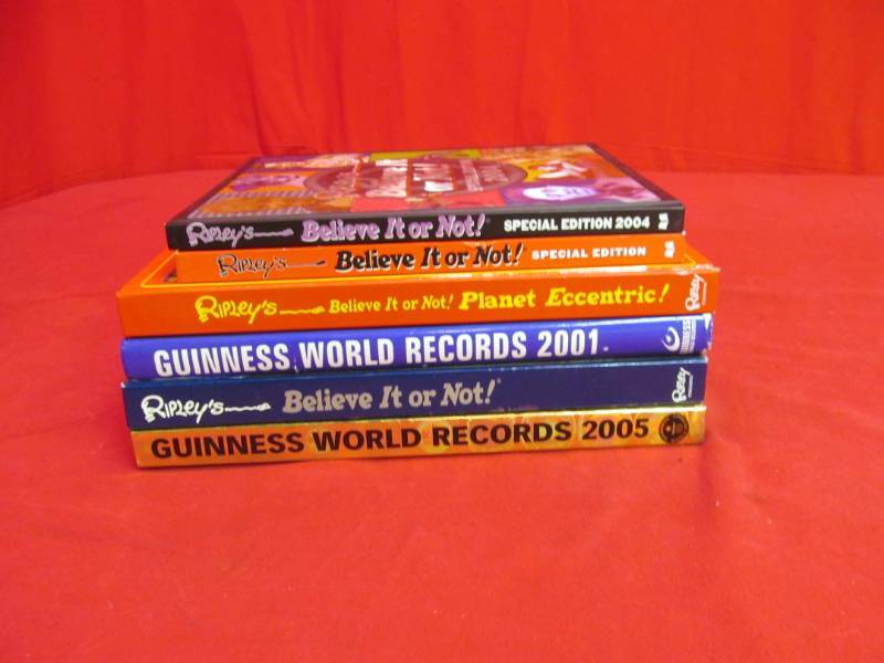 lot 153 image: 4- Ripleys Believe it or Not, 2- Guinness World of Records books (2001 & 2005)