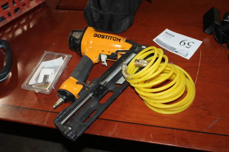 lot 59 image: Bostitch Pneumatic Nailer w Nails, Hose