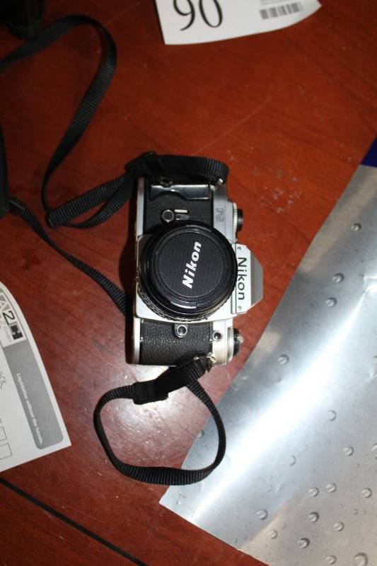 lot 91 image: Nikon Film Camera w Lens