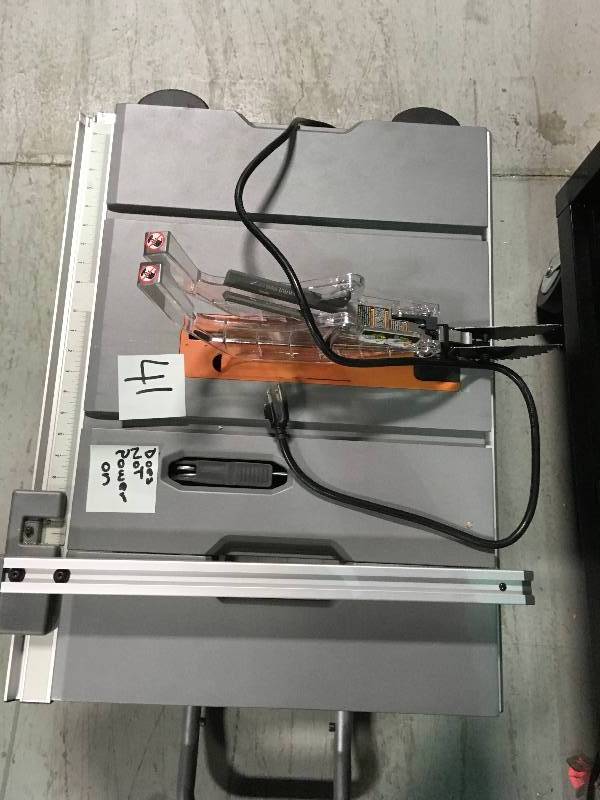 lot 41 image: Ridgid 15 Amp 10 in. Compact Table Saw DOES NOT POWER ON
