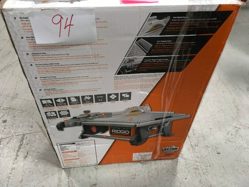lot 94 image: Ridgid  120-Volt 7 in. Table Top Wet Tile Saw MISSING SCREWS hold of blade in working conditions