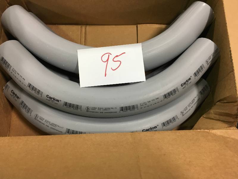 lot 95 image: CARLON 2 in. 90° Sch. 40 PVC Plain End Standard Radius Elbow (Case of 5) in good conditions