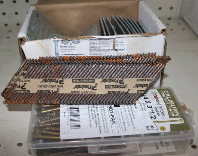 lot 143 image: Masonry Anchor Screws, Corner Braces, and 6d Nail Gun Nails
