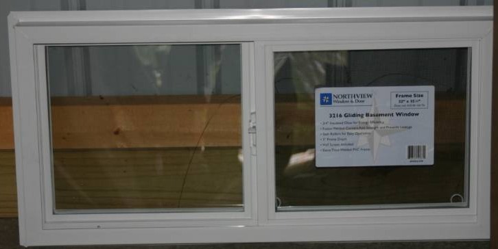 lot 546 image: Vinyl Basement Window